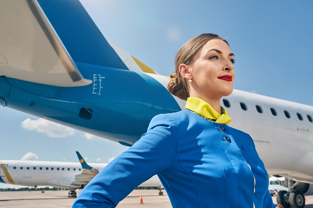 beautiful thoughtful lady with pleased smile standing airdrome